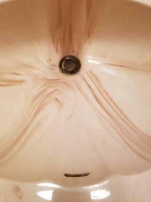 The main floor bathroom sink after I cleaned it myself.