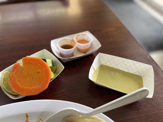 Different sauces Limes Pickled vegetables