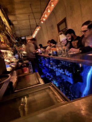 Tiny bar which is why the long waits to get in but cozy and cool vibe