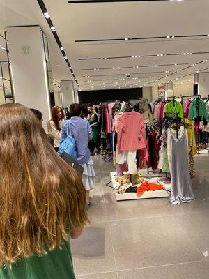 Two registers open on a weeknight. Waiting behind 100 people to make a return since they charge you to return online.