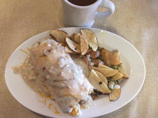 I chose a 1/2 portion of their Breakfast Burrito with Sausage, Sausage Gravy and Fried Potatoes. DELICIOUS!