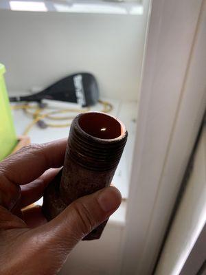 this is the inside of the pipe installed by Wallice - WITH A HOLE IN IT! They had to see water leaking as soon as they turned water on...