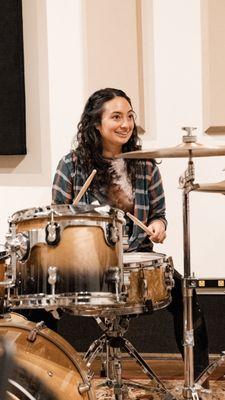 Students learning at LA Group Drum Class