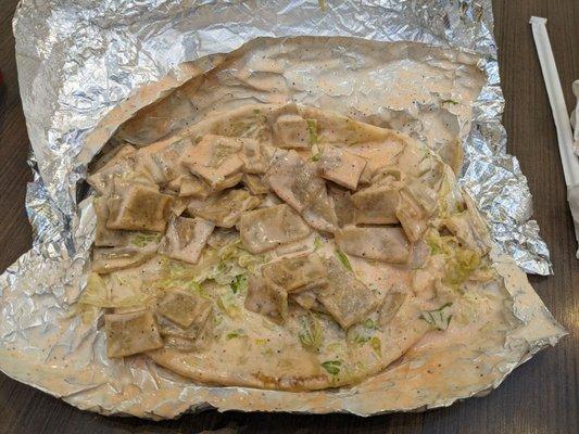 "chicken" gyro. Notice how that doesn't look like any real chicken. Flat, spongy and tasteless.