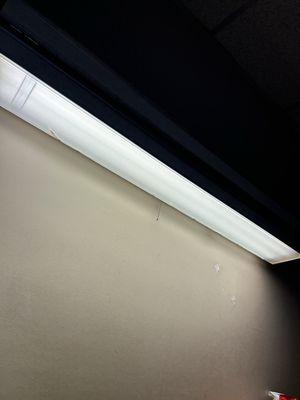 They have fluorescent lights right over the bed , blinding