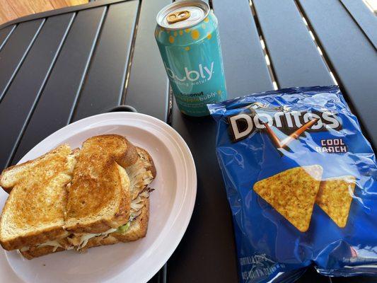 KMT sandwich, Doritos, and pineapple coconut Bubly.