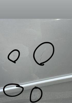 Key and scratches from annoying reckless people