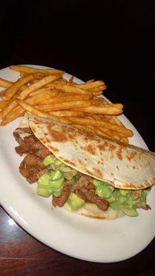 Steak Quesadilla with guacamole and a side of fries