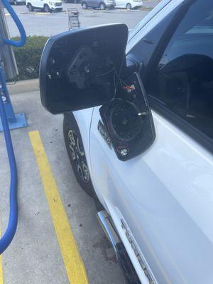 Broken mirror and housing