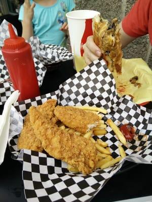 chicken tenders and a cheese steak sandwich on homemade bread.