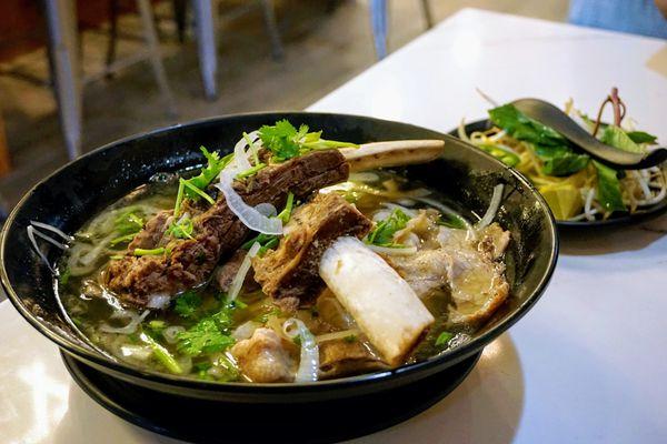 P7. Pho Beef Ribs: fresh rice noodles served with bean sprouts, basil, jalapeno slices and lime. Soup served in an oversized bowl ($20).