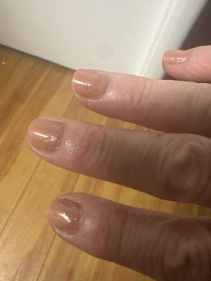 Right hand, clumpy polish.