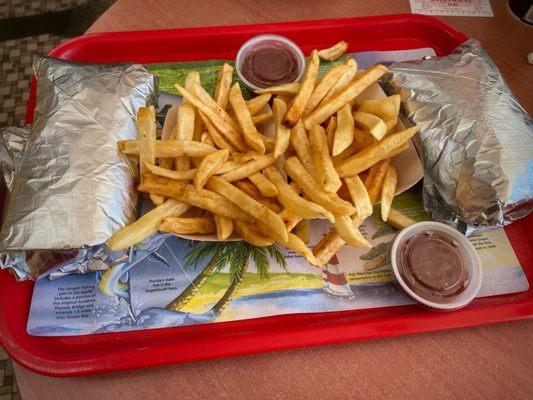 2 Greek Gyros with onions, tomatoes & tzatziki sauce on pita (platter shown with French fries)