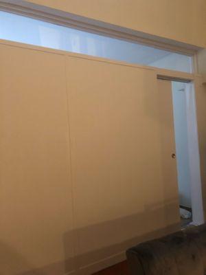 Pressurized wall with plexiglass and sliding door