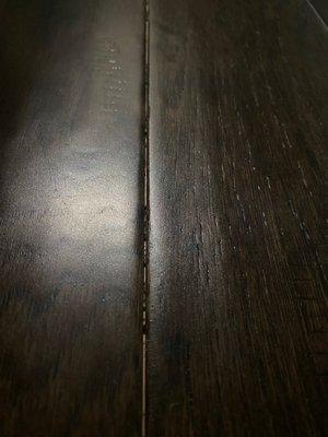 Spacing between planks.
