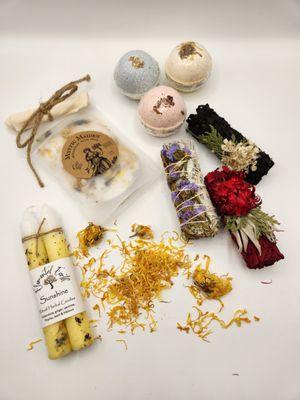 combination of herbal bath products, candles, and California sage