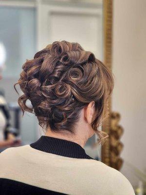 This updo was for a Masquerade Ball at Club 33, inside Disneyland.