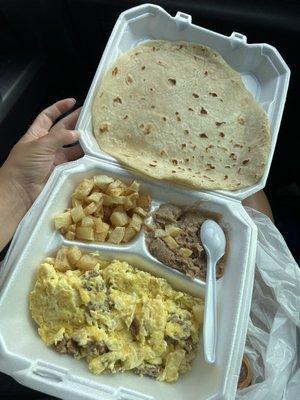 Sausage and egg plate with beans and potatoes