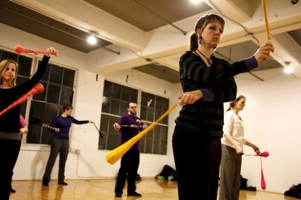 This photo from the NY Times feature on Claire's poi classes! (photo by Julieta Cervantes)