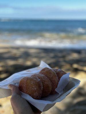 Traditional Hawaiian donuts with no filling and Li-Hing dust.