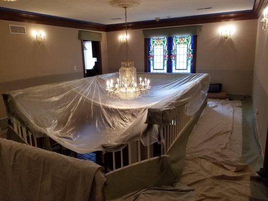 Repaired water damage on a elegant two story foyer.