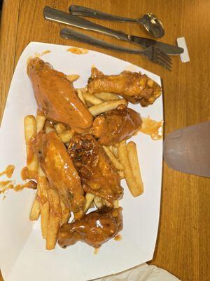 Wings and fries after I started eating!