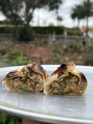 Generously filled spicy beef empanada! Had to get a pic of the middle