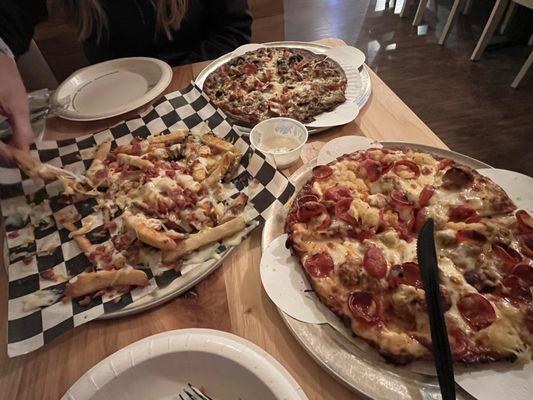 All Gluten Free, cheese fries, bacon and Ranch dressing. Pizza with pepperoni, cheese, sausage and pineapple. Delicious!! Greek pizza.