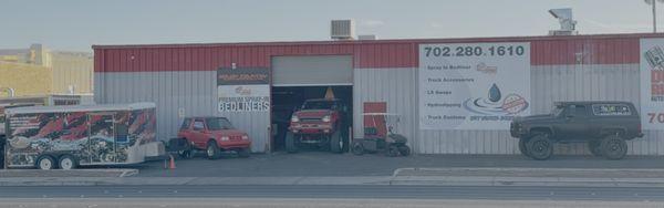 Front of Wet Workz Designs! Custom vehicles with our spray-in bedliners. Visit us today!