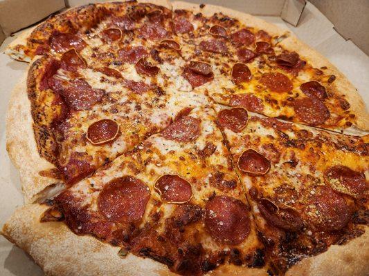 The whole half has regular pepperoni , not triple as they promote or I initially had there. No extra cheese and burnt end.