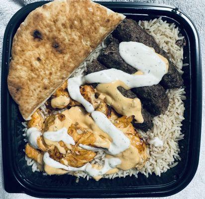 This is chicken and kofta over rice  order , it also comes with a side greek salad .