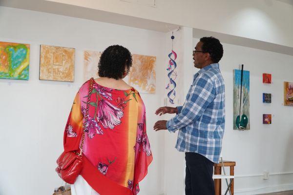 Attendees at Jeanna Brown Art Show at Counsel and Canvas Art Gallery.