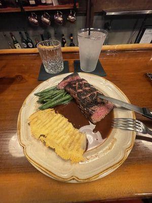 Flank Steak (medium rare) with green beans and cheesy potato.