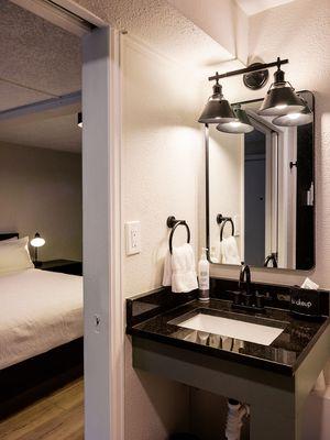 On suite bathrooms with showers and granite counter tops give a spa feel.