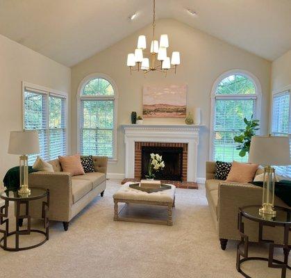 Expertly staged living rooms look spacious and up to date.