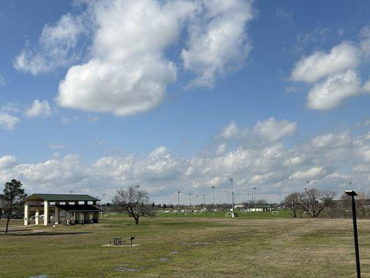 Covered gazebo with soccer fields in the background