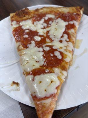 Slice of Pepperoni with just a bit of added cheese