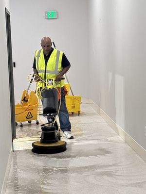 Unique shine is doing another beautiful strip and wax floor