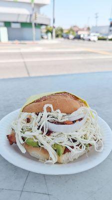 Milanesa de pollo cemitas with quesillo -- it's OK (average). Chicken pounded too thin.