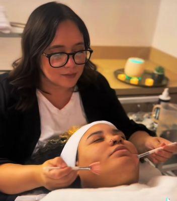 Client is receiving a 60 min facial