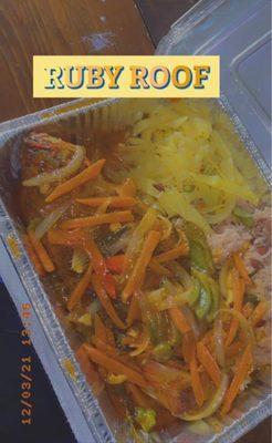 BROWN STEW SNAPPER FISH WITH RICE AND BEANS.