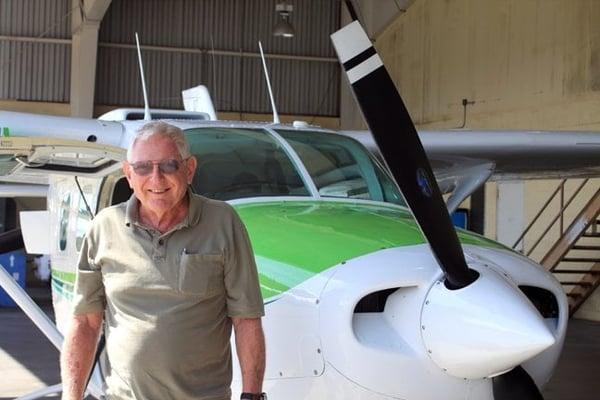 Captain John with his Cessna Skymaster 337.