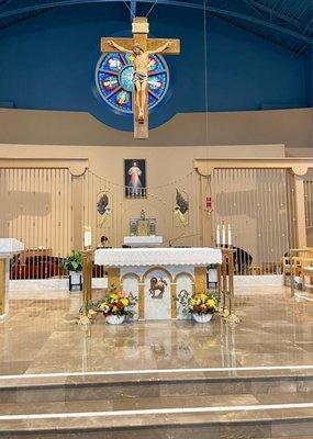 Altar, tabernacle and crucifix