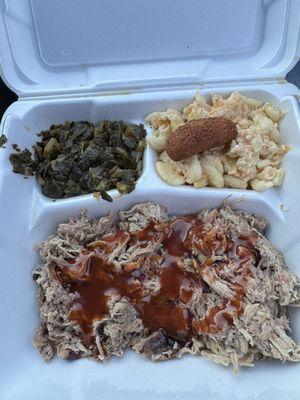 My plate: Excellent BBQ/ w sweet red sauce, collards, and mac & cheese.