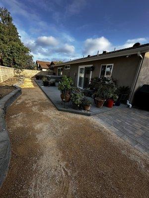 During. Extended paver patio to match exiting