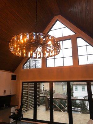 Finished sunroom with view of deck outside.