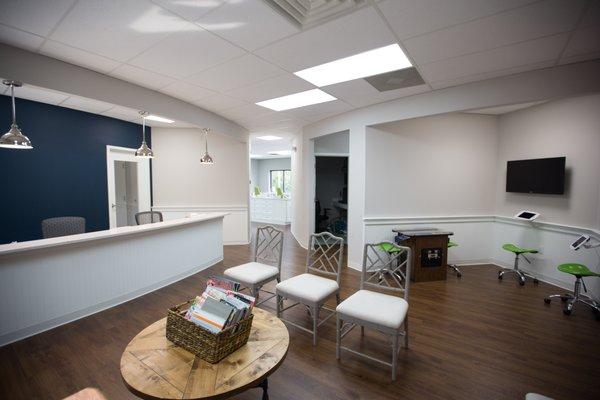 Our waiting room features coffee for parents and iPads and a Ms. Pac Man for patients and siblings.