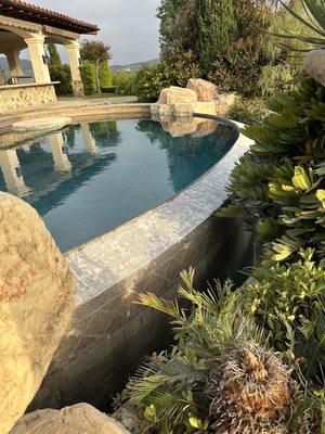 Before-old broken tile cleared away.