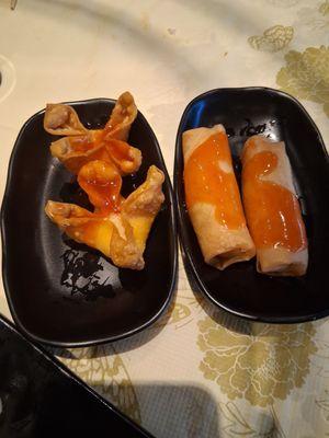 Crab rangoons and spring rolls.