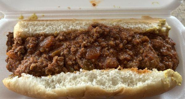 Chili dog with mustard.
